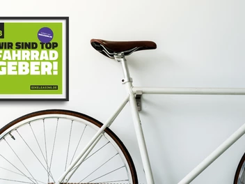 Symbolbild mit Fahrrad und Auszeichnung als Top-Fahrradgeber