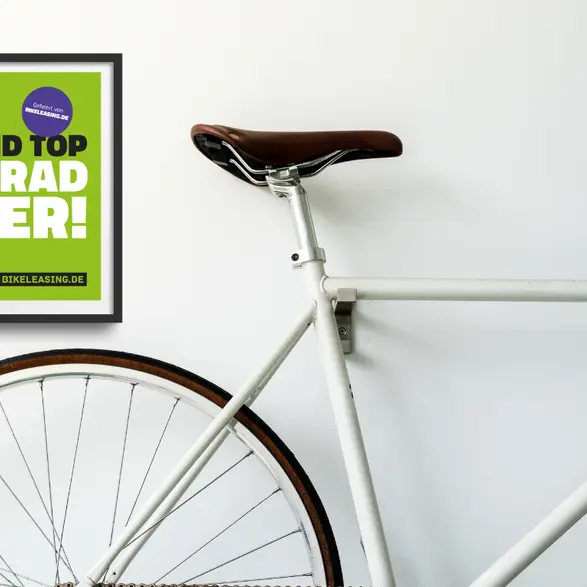 Symbolbild mit Fahrrad und Auszeichnung als Top-Fahrradgeber