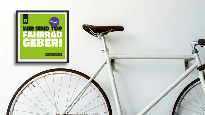 Symbolbild mit Fahrrad und Auszeichnung als Top-Fahrradgeber